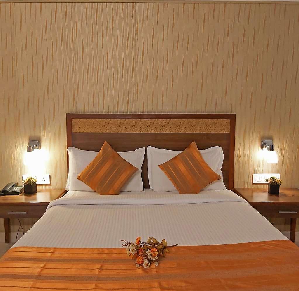 Quality Inn Mint Пуна Номер фото